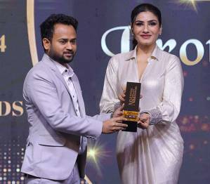 Raveena Tandon Presents NQA 2024 to Caribbean Holidays International - International Excellence Awards