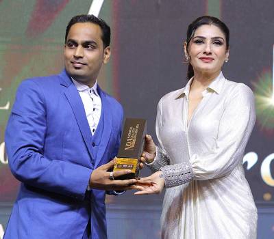 Dr Vikram Pratap Singh Honored at NQA 2024 by Raveena Tandon